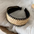 Detail shot of straw woven wide headband with black border, chic summer vacation hair accessory. - Edged Straw Headband - Black Edge