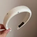 White padded headband for women featuring delicate daisy embroidery, elegant hair accessory. - White Daisy Wide Headband