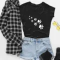 Casual black women's short sleeve t-shirt with white cat paw print, stylish daily outfit. - S / Tops / Black (White Paw Print)