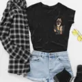 Detail view of black short-sleeve t-shirt with cute puppy pocket print, stylish outfit flat lay. - S / Tops / Black
