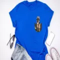 Blue t-shirt detail featuring a cute German shepherd puppy print pocket design in flat lay. - Sapphire Blue