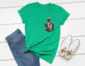 Green graphic t-shirt featuring a cute German Shepherd puppy print, styled flat lay detail. - S / Tops / Green