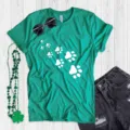 Green short sleeve t-shirt featuring cute white cat paw print graphics, casual daily wear. - Green (White Paw Print)