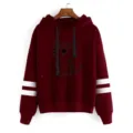 Detailed view of the burgundy hooded sweatshirt featuring a cute cat print and stylish double arm stripes. - Burgundy
