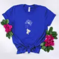 Detailed view of blue short sleeve t-shirt with cute elephant dandelion print and knotted hem. - Sapphire Blue