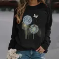 Sudadera negra casual de manga larga para mujer con estampado detallado de diente de león - S / Tops / Negro