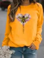Damen orangefarbenes Sweatshirt mit Rundhalsausschnitt, süßem Bienen- und Blumen-Herz-Druck. - Gelb