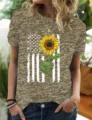 Heather gray short sleeve t-shirt featuring vintage American flag and sunflower print. - Gold