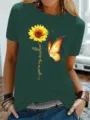 Donkergroen dames T-shirt met korte mouwen en zonnebloem en vlinder print opdruk. - S / Tops / Donkergroen