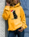 Women yellow long sleeve hooded sweatshirt featuring a cute Christmas black cat print design. - S / Tops / Yellow