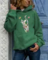 Green long sleeve hoodie detail with artistic cat graphic print and cozy hood for women style. - Green