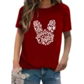 Detailed view of women's red short sleeve T-shirt featuring a cute Easter bunny graphic and text. - S / Tops / Burgundy