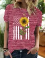 Women's heather red short sleeve t-shirt featuring a stylish American flag sunflower print. - S / Tops / Red