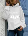 Dettaglio felpa grigia casual con stampa gatto carina e slogan, comodo top a maniche lunghe. - Taglia S / Top / Bianco