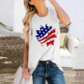 Detail shot of women's summer sleeveless tank top with American flag sunflower print design. - S / Tops / White