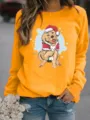 Detail view of the cute Christmas golden retriever printed orange long sleeve sweatshirt. - S / Tops / Yellow