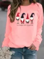 Detailed view of women's pink Christmas gnome print crewneck fleece sweatshirt casual top. - Pink