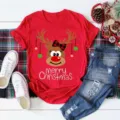 Christmas reindeer print t-shirt flat lay detail showing festive red holiday top design. - S / Tops / Red