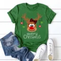 Detailed view of Christmas reindeer print green t-shirt with rolled sleeves and festive vibe. - S / Tops / Green