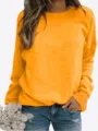 Women solid orange long sleeve crewneck sweatshirt casual pullover top for autumn daily wear. - Yellow