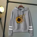 Casual grey hooded sweatshirt for women, featuring a sunflower and butterfly print with long sleeves. - Gray