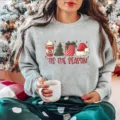 Grey Christmas sweatshirt with festive graphic print, long sleeves, cozy holiday wear for women. - S / Tops / Gray