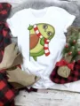 Cute Christmas avocado print detail on casual white short sleeve t-shirt, holiday styled look. - S / Top - Cartoon Avocado (QLO31127) / White