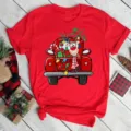 Red short sleeve t-shirt with cute Christmas reindeer and truck graphic print for holiday season. - S / Christmas Truck and Reindeer (BT8519) / Red