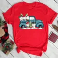 Detailed close-up shot of red short sleeve T-shirt with cute Christmas truck snowman graphic. - S / Snowman and Truck (BT8526) / Red