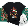 Black short sleeve t-shirt featuring a festive wine glass Christmas tree graphic design. - S / Tops / Christmas Wine Glass Tree Style (Bt9853-hs)