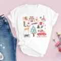 Vue détaillée du t-shirt blanc présentant une superbe impression graphique d'aquarelle de Noël. - 3XL / Hauts / Imprimé Aquarelle Tis The Season