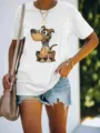 Casual women's white short-sleeve t-shirt featuring a playful cartoon dog graphic print. - S / Tops / White