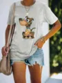 Casual grey short sleeve t-shirt featuring a cute patchwork cartoon dog print for women. - Gray