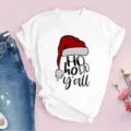 Detailed view of white short sleeve t-shirt with Christmas Santa hat and text print, flat lay. - 3XL / Tops / Santa Hat Print