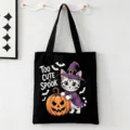 Zwarte Halloween canvas tote tas met schattige kat en pompoen print voor dagelijks gebruik. - Zwarte Geest en Pompoen Slogan Stijl (9121) / 35cmx45cm