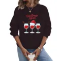 Close-up detail van het donkere sweatshirt met lange mouwen en kerstwijnglasafbeelding. - S / Tops / Zwart