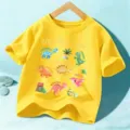 Camiseta de algodón amarilla de manga corta para niños con lindo estampado de dinosaurio y texto - Amarillo