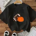 Black short sleeve t-shirt with fall football pumpkin graphic casual autumn top for women. - S / Tops / Black