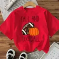 Red short sleeve t-shirt featuring fall and football graphic print for women casual wear - S / Tops / Red