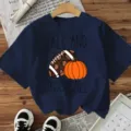 Casual short sleeve t-shirt featuring fall football and pumpkin graphic print for women. - Navy Blue