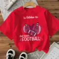 Red short sleeve t-shirt with festive pumpkin and football graphic print for women. - S / Tops / Red