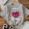 Casual grey short sleeve t-shirt with pink pumpkin and football graphic for daily women wear. - Gray