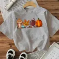 Graues Kurzarm T-Shirt mit Herbst Kürbis und Fussball Grafik für Damen Freizeitkleidung. - Grau