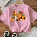 Dames roze korte mouw t-shirt casual top met schattige herfst Halloween gnoom pompoen print. - S / Tops / Roze Katoen