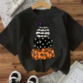 Zwart t-shirt met korte mouwen en Halloween pompoen print, stijlvolle feestkleding. - S / Tops / Zwart