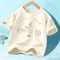 Camiseta de manga corta de Halloween para niños, top beige lindo con estampado de bruja - Algodón Beige