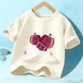 T-shirt manches courtes pour enfants, top beige en coton avec motif de citrouille et football. - Coton Beige