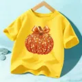 Kids yellow short sleeve t-shirt with sparkly Halloween pumpkin graphic for boys and girls. - Cotton Yellow