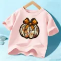 Rosa Kinder Kurzarm T-Shirt mit herbstlichem Kürbis Schleifen Motiv für den Alltag. - 110cm / Baumwolle Rosa