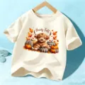 Kids autumn short sleeve t-shirt featuring cute highland cow pumpkin graphic for holiday daily wear. - Apricot